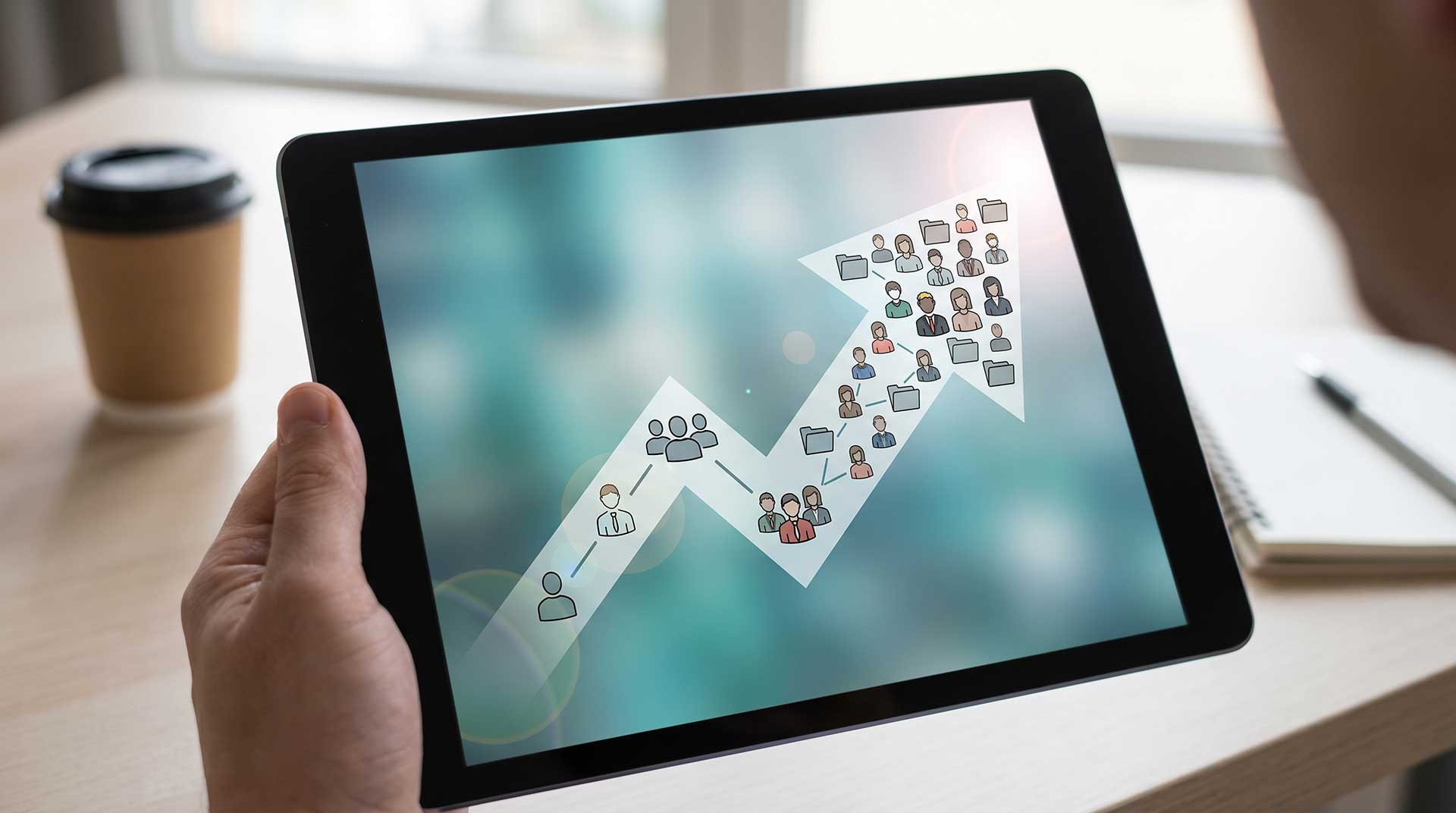 A visual representation of a single user icon transitioning into a network of 20+ icons
